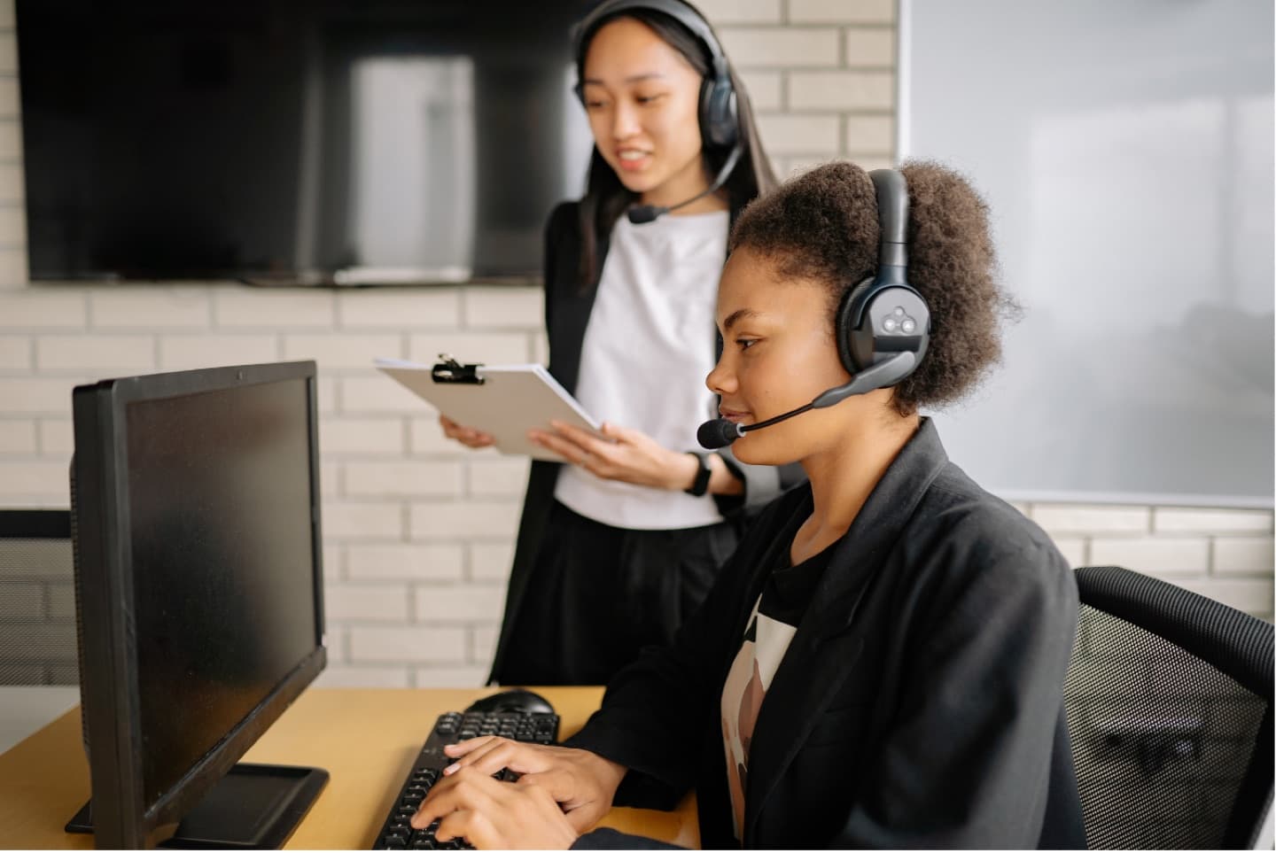 Team collaborating at a computer